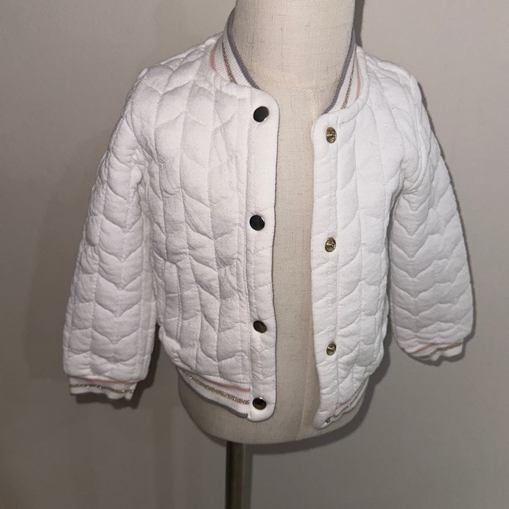White bomber. Gold buttons. 18 months. Good condition.